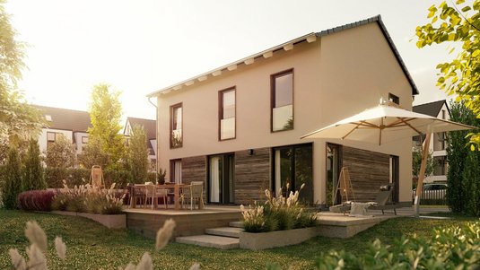 Modernes Zuhause im Grünen mit viel Raum für Familien Modernes Massivhaus mit hellem Fassadenbild in naturnaher Umgebung für komfortables Wohnen