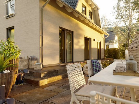 Landhaus 142 für klassisches Wohnen im Grünen Landhaus 142 mit traditioneller Architektur, das im Baugebiet Wacholderweg in Daverden gebaut werden kann, ideal für Familien mit Sinn für Stil und Raum