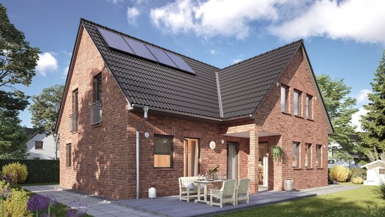 Doppelhaus mit roter Klinkerfassade, Satteldach, Solaranlage, Terrasse und Garten in Bruchhausen-Vilsen.