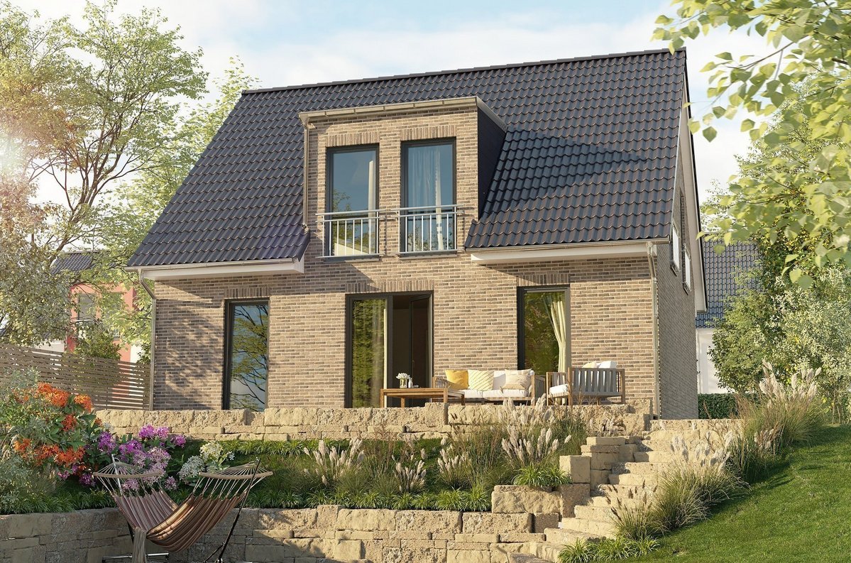 Einfamilienhaus mit Klinkerfassade in Leese Modernes Einfamilienhaus mit Klinkerfassade, Satteldach, Terrasse und Garten als Beispiel für den Hausbau in Leese mit Contura Bau GmbH