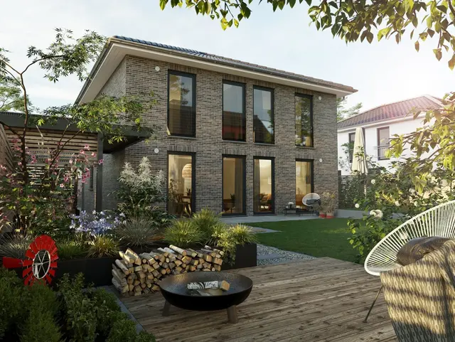 Modernes Einfamilienhaus mit Garten und Terrasse Zweigeschossiges Einfamilienhaus mit moderner Fassade und Garten