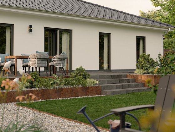 Bungalow mit Terrasse und Garten in Stolzenau Moderner Bungalow mit heller Fassade, Terrasse, Garten und Sitzbereich in einem Wohngebiet in Stolzenau.