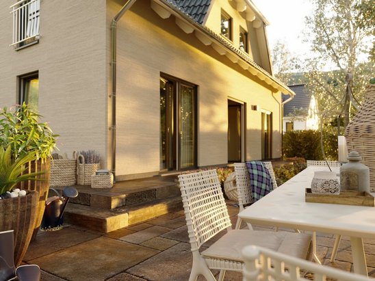 Landhaus 142 mit traditioneller Architektur, das im Baugebiet Wacholderweg in Daverden gebaut werden kann, ideal für Familien mit Sinn für Stil und Raum