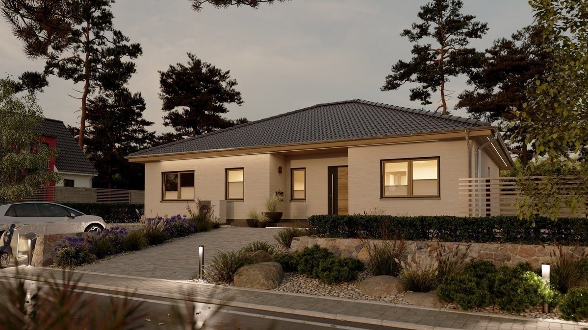 Moderner Bungalow bei Sonnenuntergang als Inspiration für den Hausbau in Diepholz